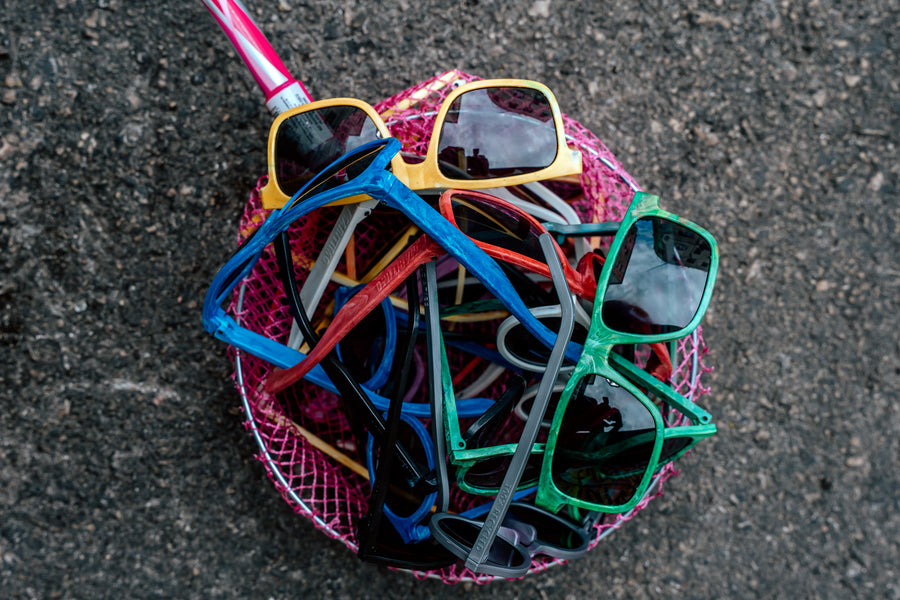 Person wearing Floaties recycled sunglasses