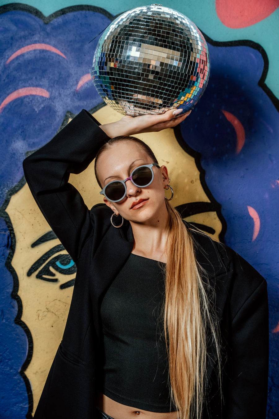Person wearing Floaties recycled sunglasses