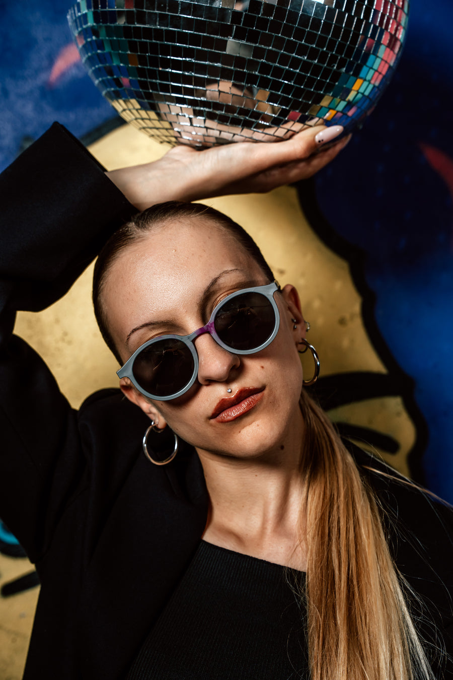 Person wearing Floaties recycled sunglasses