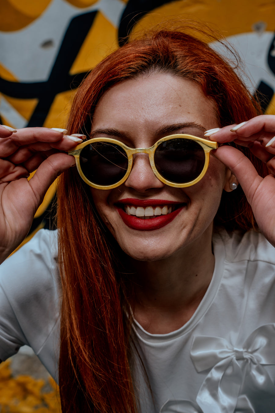 Person wearing Floaties recycled sunglasses