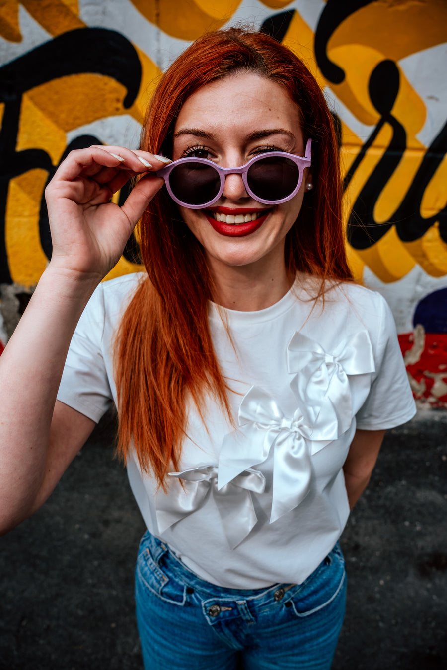 Person wearing Floaties recycled sunglasses