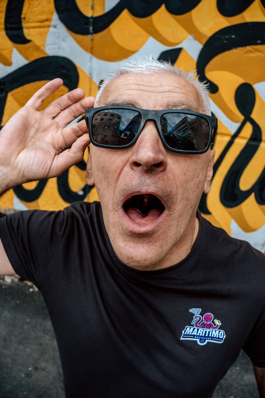 Person wearing Floaties recycled sunglasses