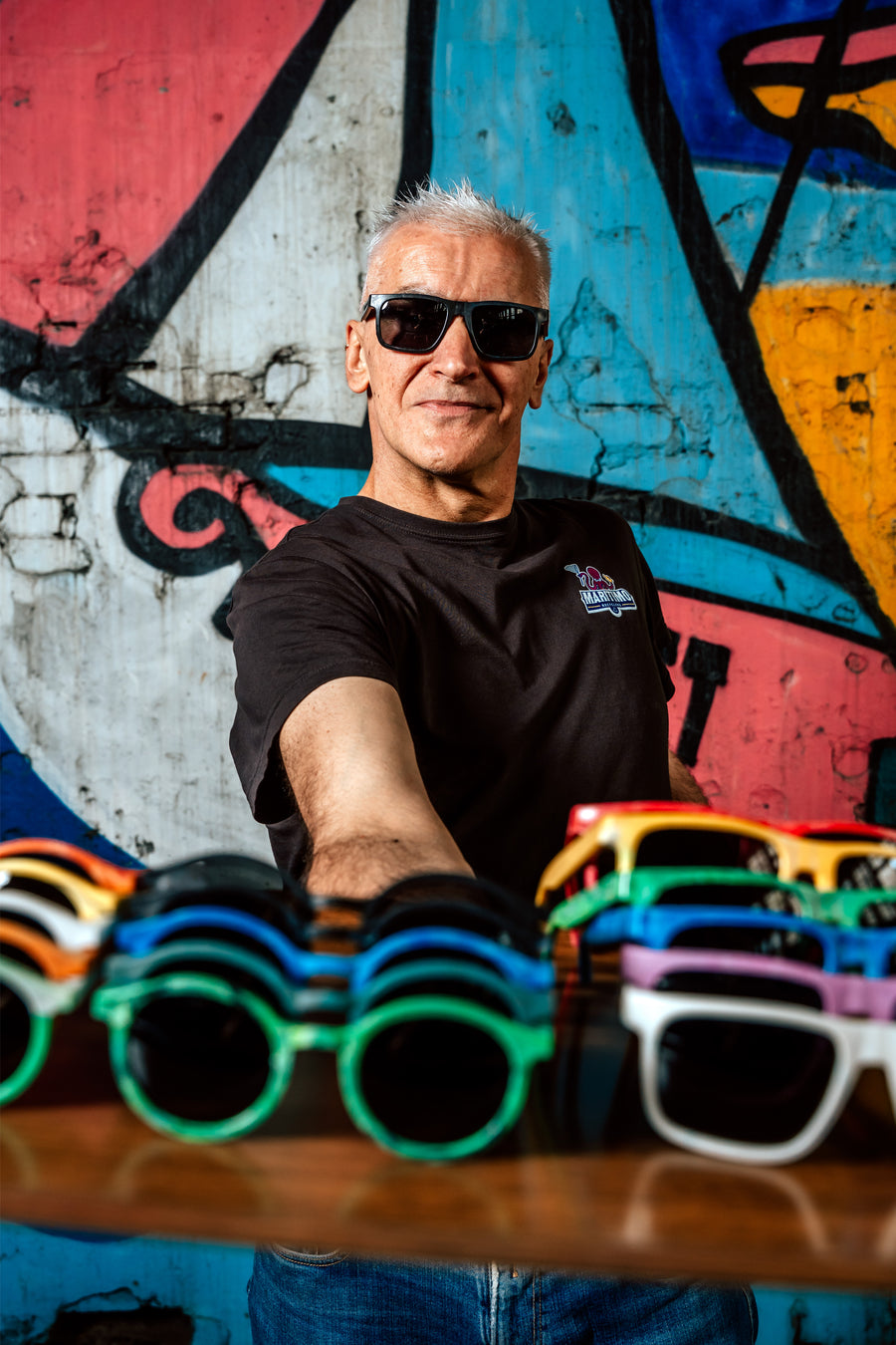 Person wearing Floaties recycled sunglasses