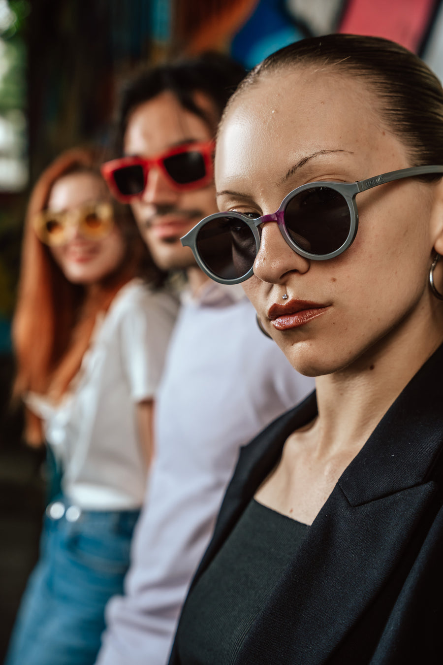 Person wearing Floaties recycled sunglasses