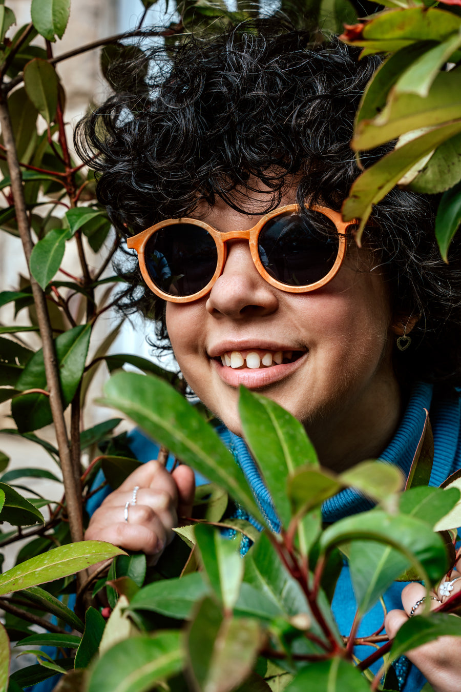 Person wearing Floaties recycled sunglasses